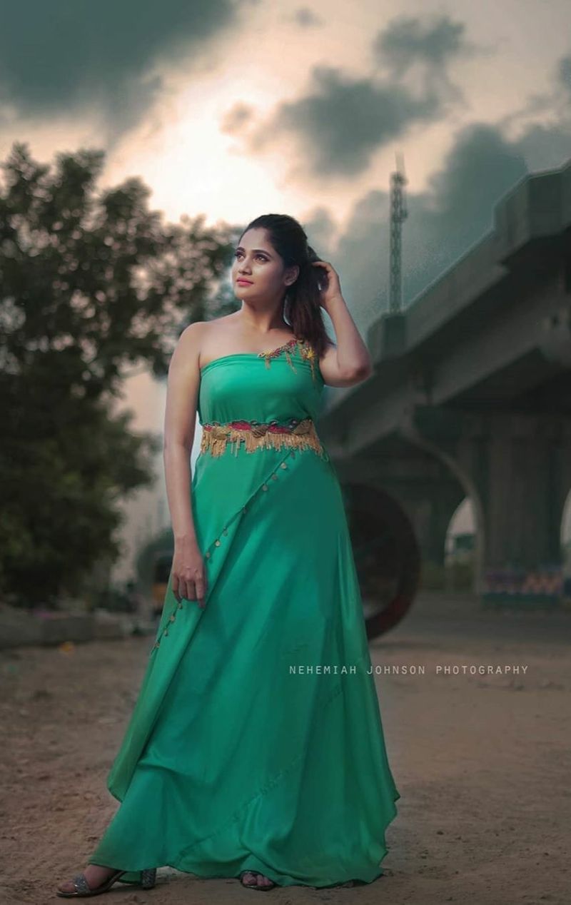 biggboss losliya recent sharing green color dress photo gallery