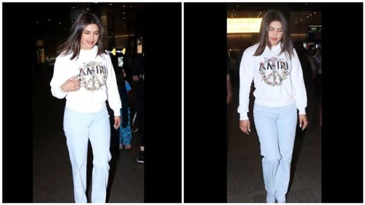 Priyanka Chopra pairs Rs 50k sweatshirt with jeans and boots at Mumbai airport Priyanka Chopra pairs Rs 50k sweatshirt with jeans and boots at Mumbai airport