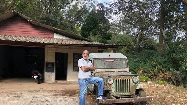 Alphonse Kannanthanam and his old jeep Alphonse Kannanthanam and his old jeep