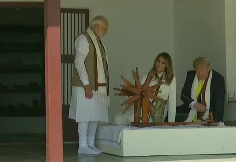 trump india visit melania and trump visits sabarmati ashram uses charkha