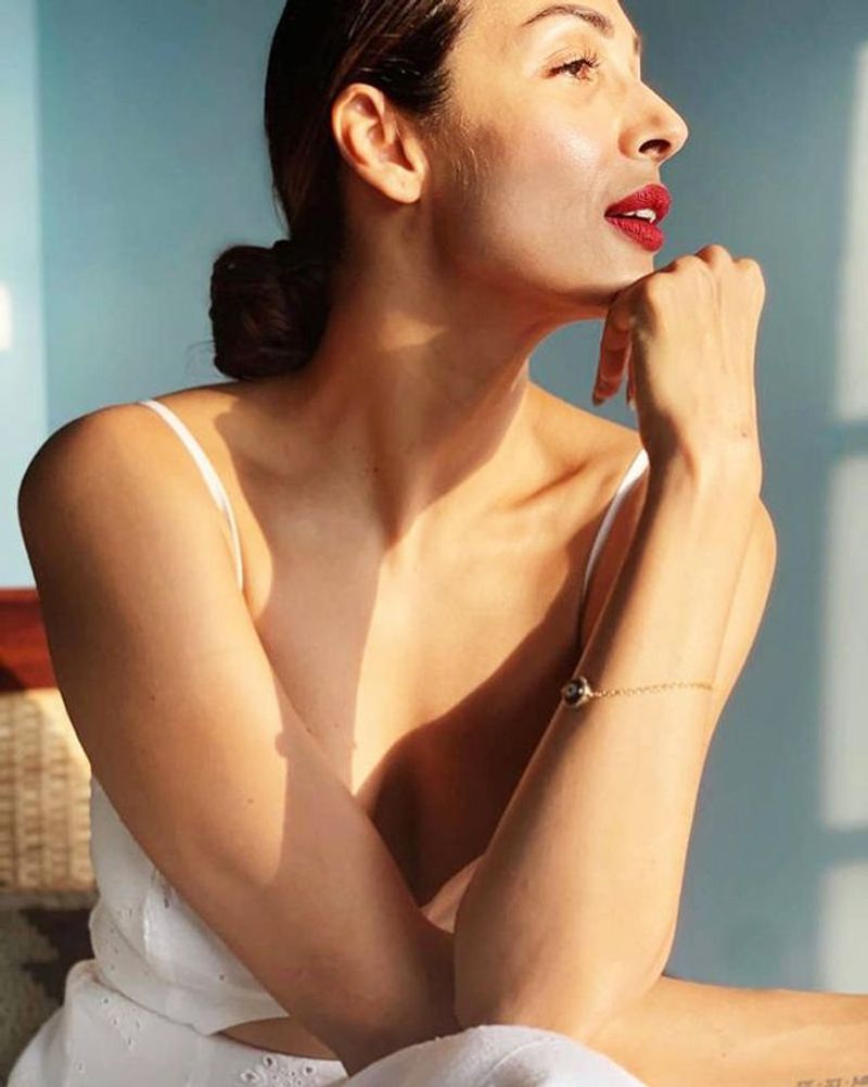 Malaika Arora in yellow one-shoulder thigh-slit dress