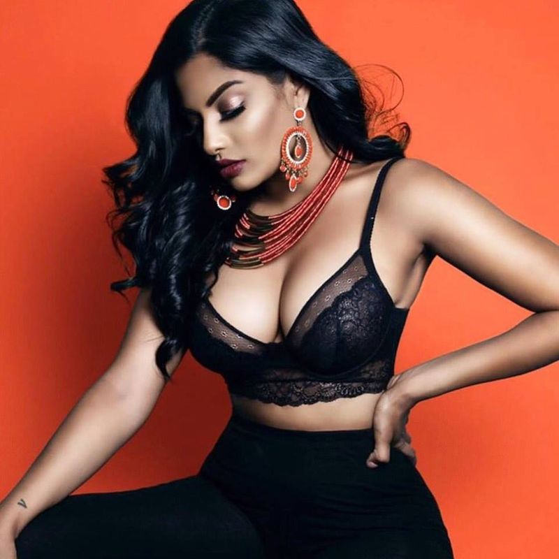 Tamil actress who plays rugby in a dark room with cricketers