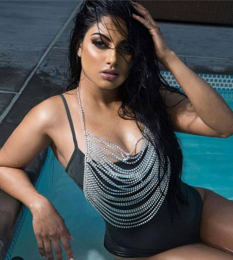 Tamil actress who plays rugby in a dark room with cricketers