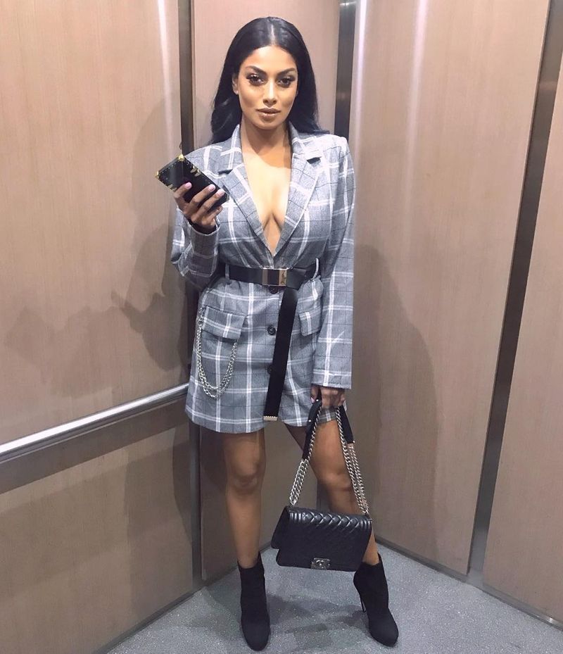 Tamil actress who plays rugby in a dark room with cricketers