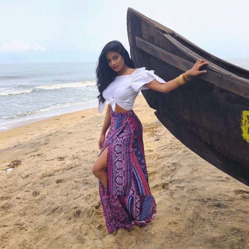 Tamil actress who plays rugby in a dark room with cricketers