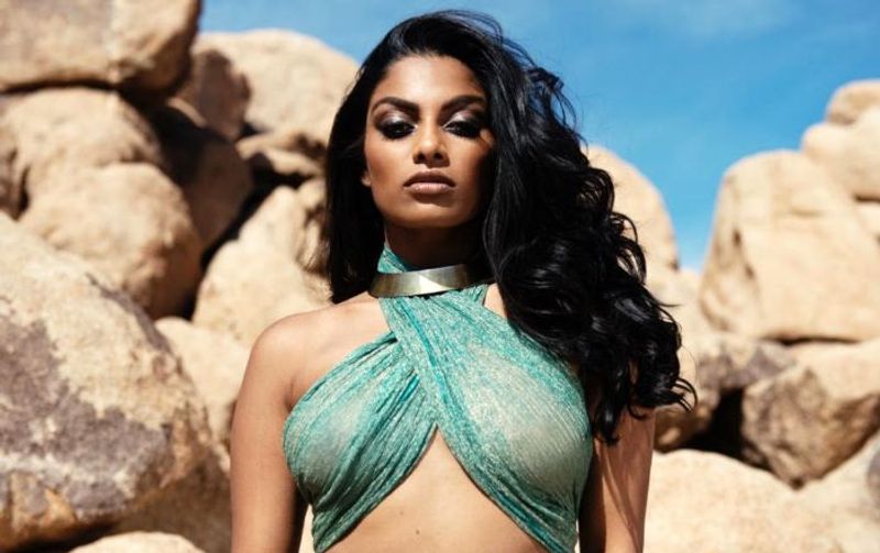 Tamil actress who plays rugby in a dark room with cricketers
