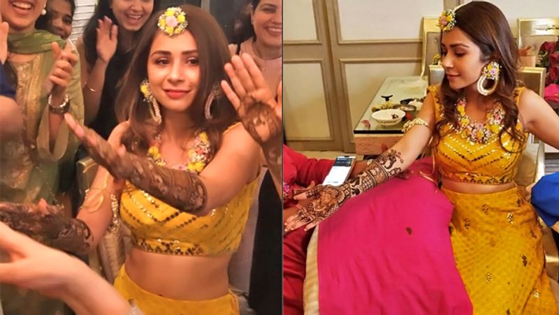 मेहंदी सेरेमनी में कुछ इस अंदाज में दिखीं सोनाक्षी राज।