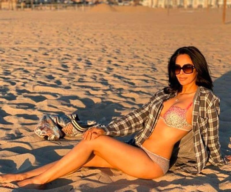 mallika sherawath rises heat in yoga poses ksr