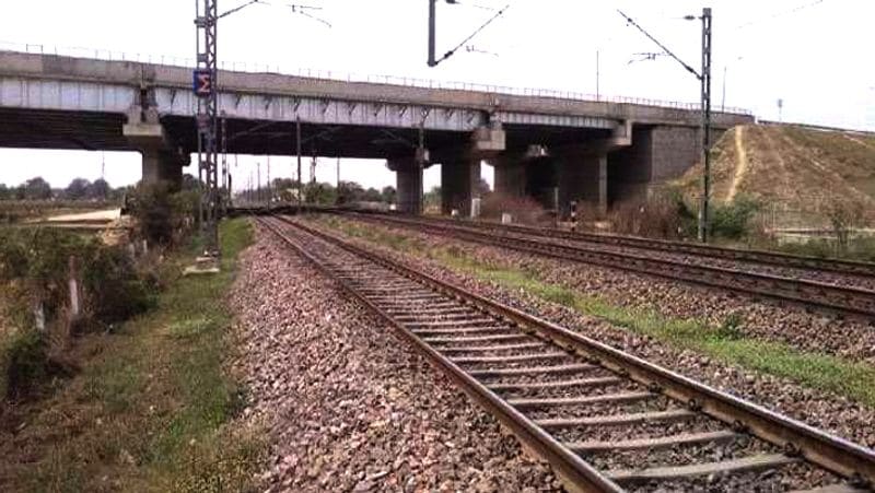 Man Slept train track