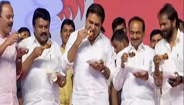 telangana ministers had chicken at public meeting for to create awareness like corona virus not by chicken telangana ministers had chicken at public meeting for to create awareness like corona virus not by chicken
