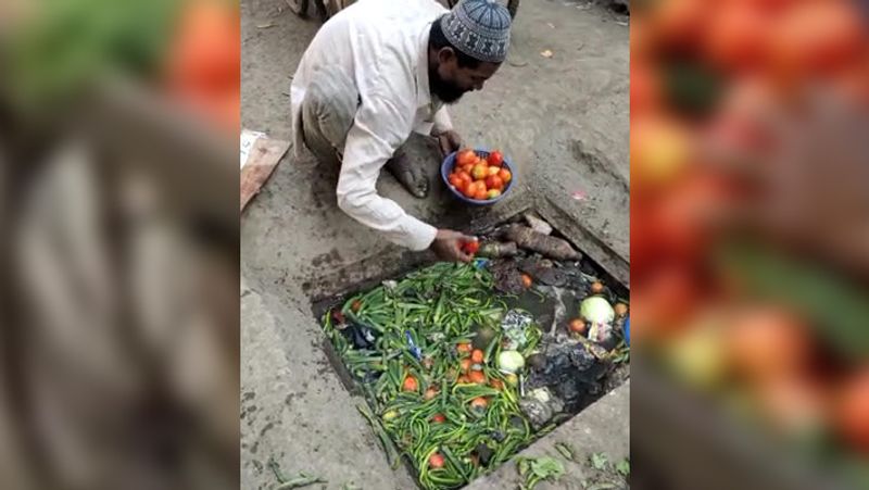 Shocking photos of vegetable vendor selling tomatoes and peas washed in dirty drainage water kph