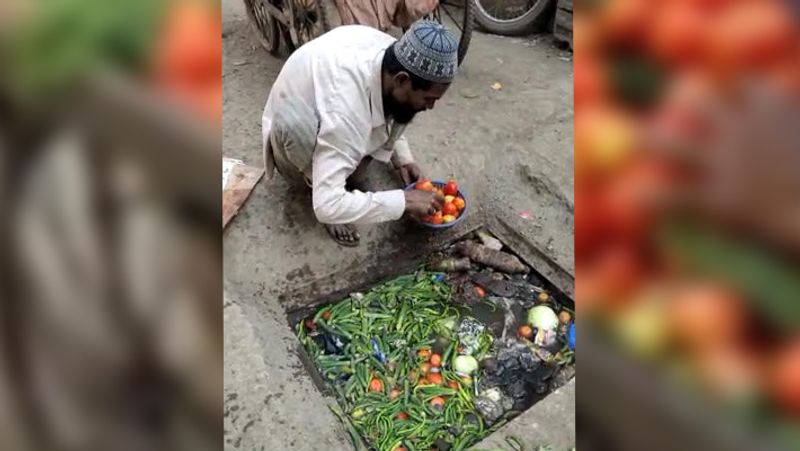 Shocking photos of vegetable vendor selling tomatoes and peas washed in dirty drainage water kph