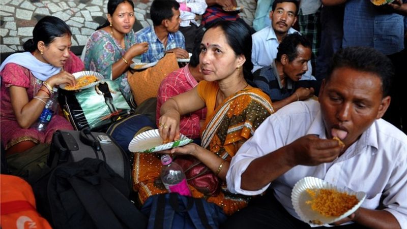 People in Varanasi enjoy free egg chicken party during corona virus tension kph