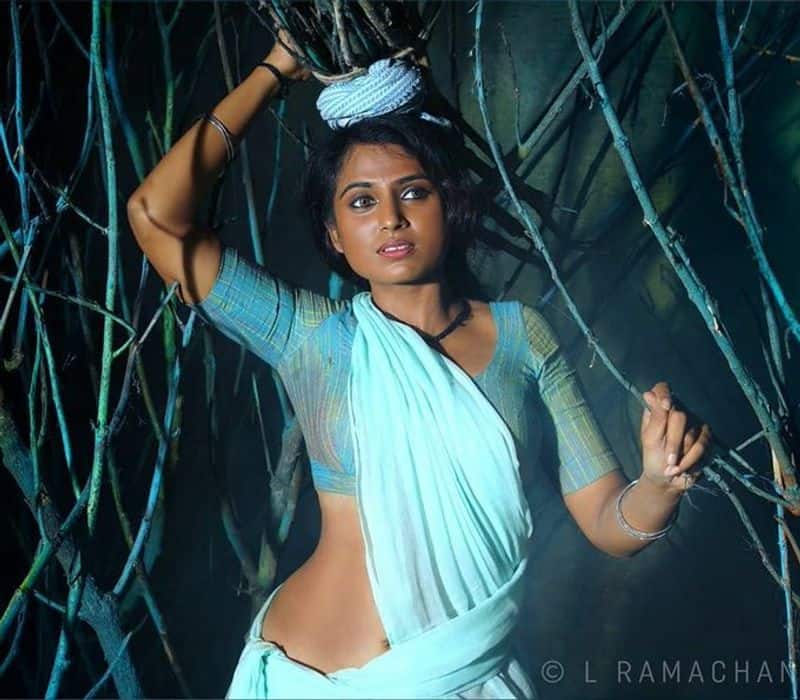 Ramya Pandiyan showing up at the waist and also in the corona
