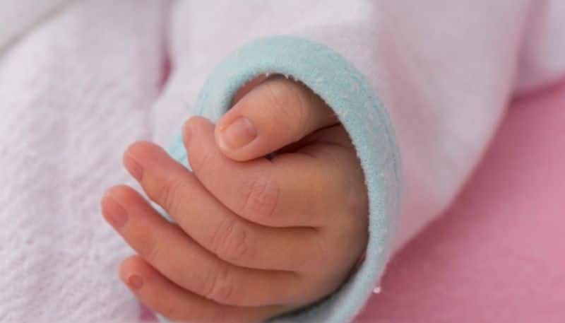 doctors and nurse saved a newborn baby in icu