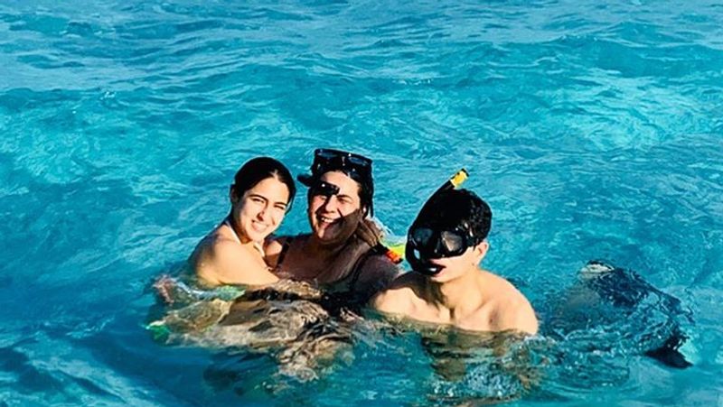Within a few minutes, her comment section was also filled with wishes and heart-shaped emojis. But the sad part was, many started trolling her and slamming her for wearing a bikini in front of her brother.
