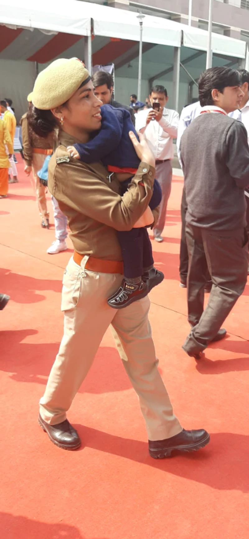 womens day 2020 mother hold baby on duty isnpiring stories kpt