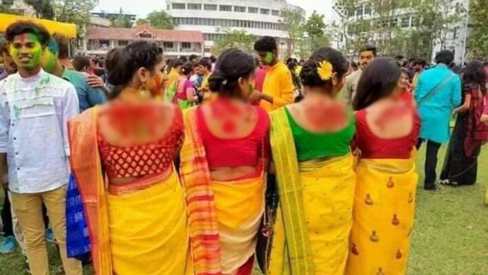 RBU holi celebrations invite controversy as abusive words on displayed students bodies RBU holi celebrations invite controversy as abusive words on displayed students bodies