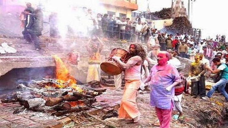shiva devotees celebrate chita bhasma holi at the cremation ground kpl