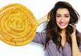 Shraddha Kapoor cant hide her glee as Tiger Shroff gifts giant jalebi on her birthday
