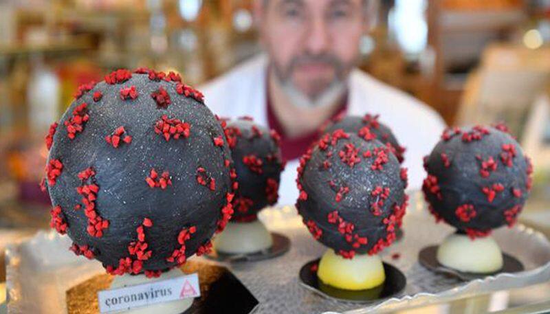 french baker makes easter eggs in the model of coronavirus