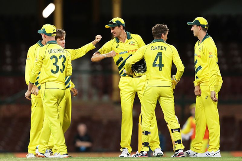 Photos empty stadium no handshakes Australia-New Zealand ODI players celebrate touching elbows fists