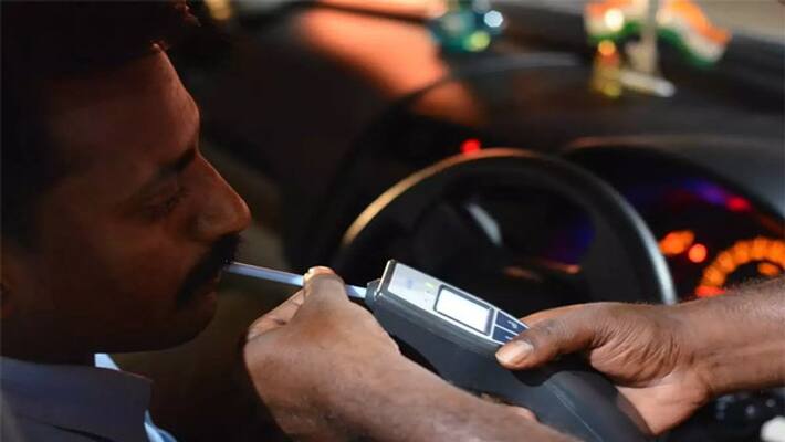 Drunk man sets bike on fire after being caught in hyderabad Drunk man sets bike on fire after being caught in hyderabad