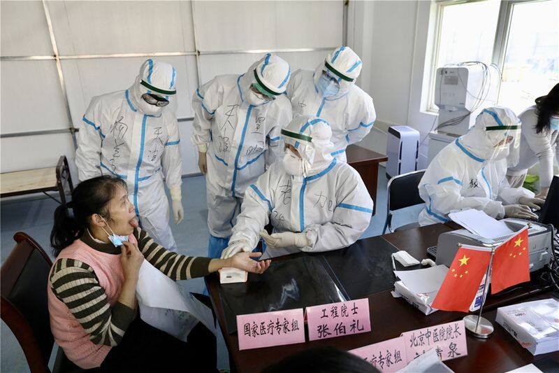 china release book let about corona virus treatment method