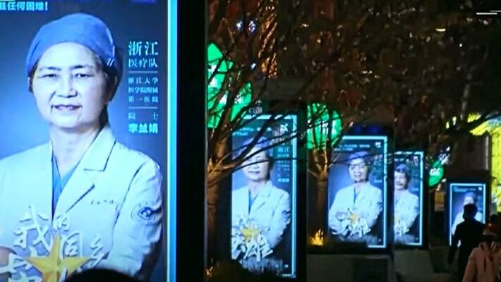 China pay tribute to health workers, buildings in light up with their faces China pay tribute to health workers, buildings in light up with their faces