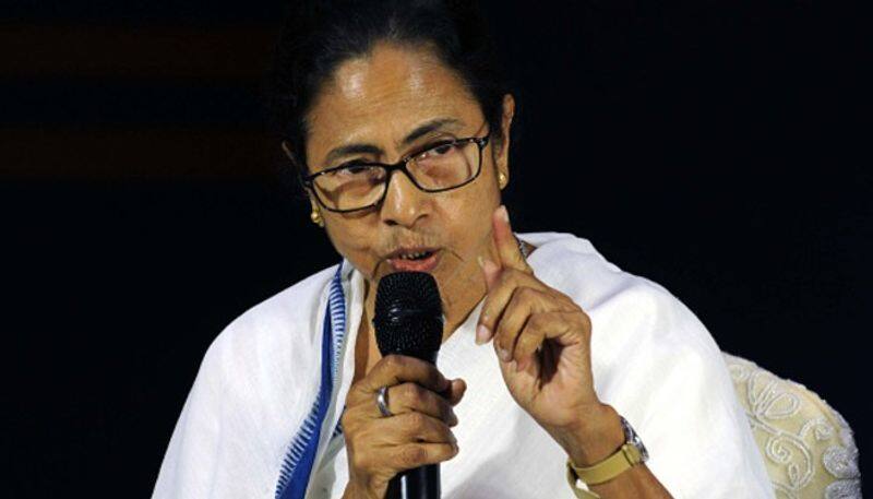 While India battles coronavirus, Mamata Banerjee is worried about the colour of PPEs!