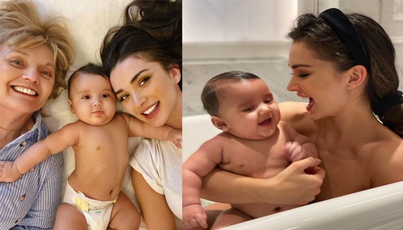 Amy Jackson gets trolled for wearing side chest revealing dress in front of her son ADB