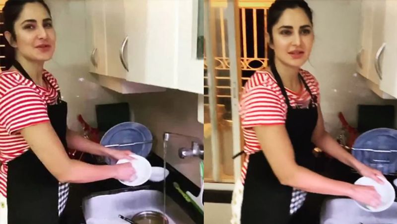 After washing dishes Katrina kaif picks up a broom and clean her room