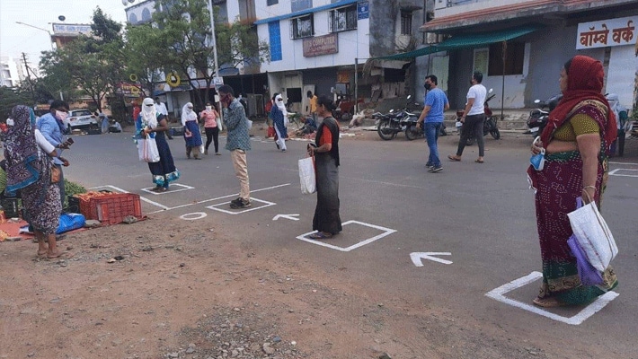 coronavirus lockdown in india social distancing images for Shopkeeper kpr