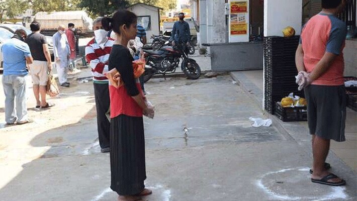 coronavirus lockdown in india social distancing images for Shopkeeper kpr