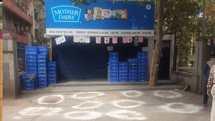 coronavirus lockdown in india social distancing images for Shopkeeper kpr