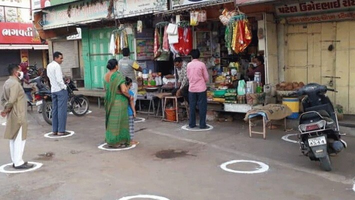 coronavirus lockdown in india social distancing images for Shopkeeper kpr