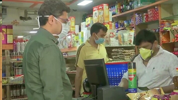 coronavirus lockdown in india social distancing images for Shopkeeper kpr