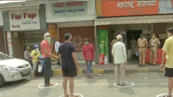 coronavirus lockdown in india social distancing images for Shopkeeper kpr