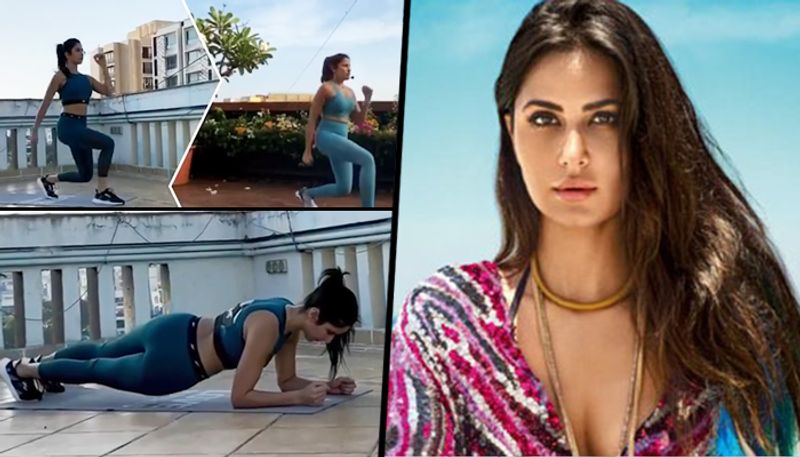 After washing dishes Katrina kaif picks up a broom and clean her room