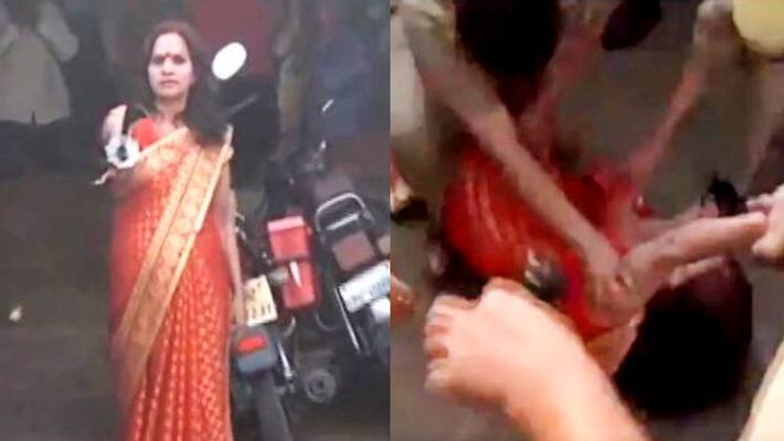 COVID-19 lockdown, UP Godwoman brandishes sword at police, insisting gathering, Dragged into custody COVID-19 lockdown, UP Godwoman brandishes sword at police, insisting gathering, Dragged into custody