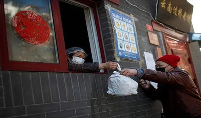 chinese restaurant banner celebrates as corona virus is killing people in america japan kph