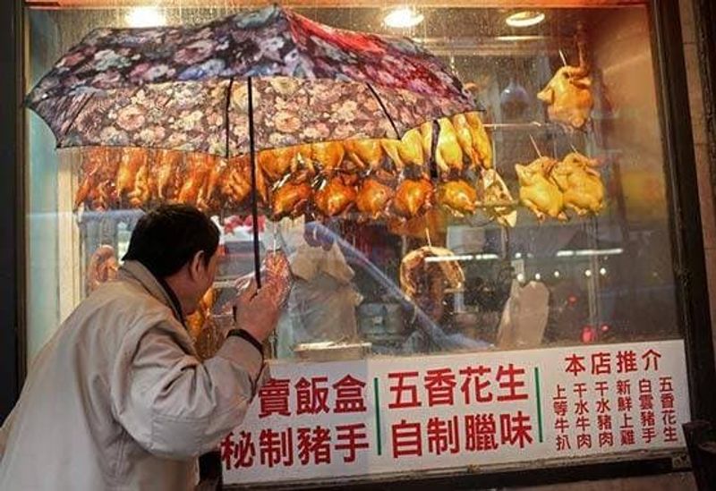 chinese restaurant banner celebrates as corona virus is killing people in america japan kph