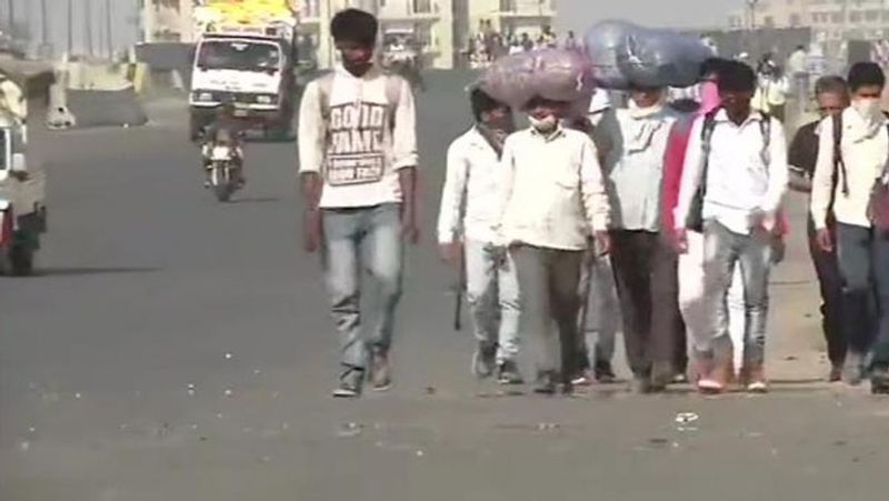 people returning home walking hundreds of km to save lives from Corona kpl