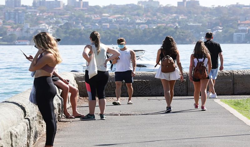 crowd gathered on australian roads and beaches to enjoy during corona outbreak can help spread virus rapidly kph