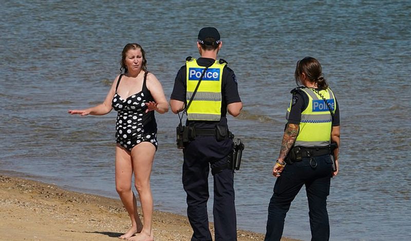 crowd gathered on australian roads and beaches to enjoy during corona outbreak can help spread virus rapidly kph