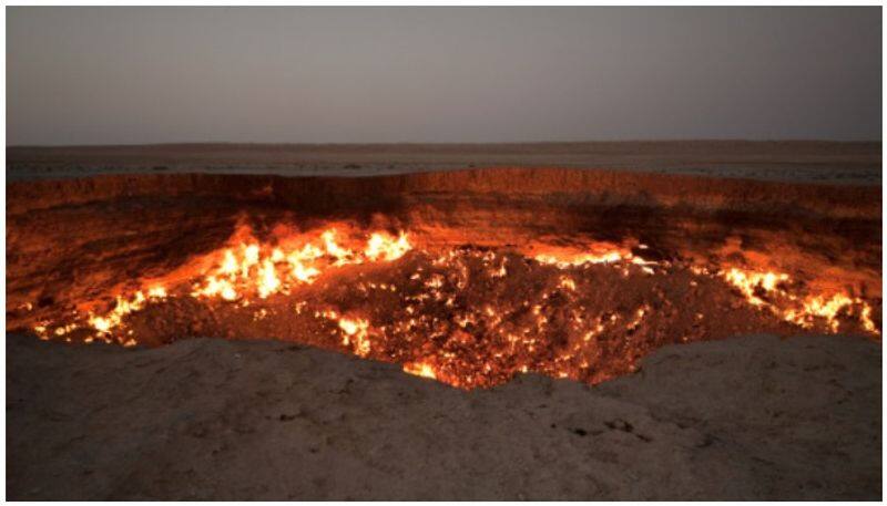 scientists wonders on Darvaza gas crater which has been burning for more than 50 years