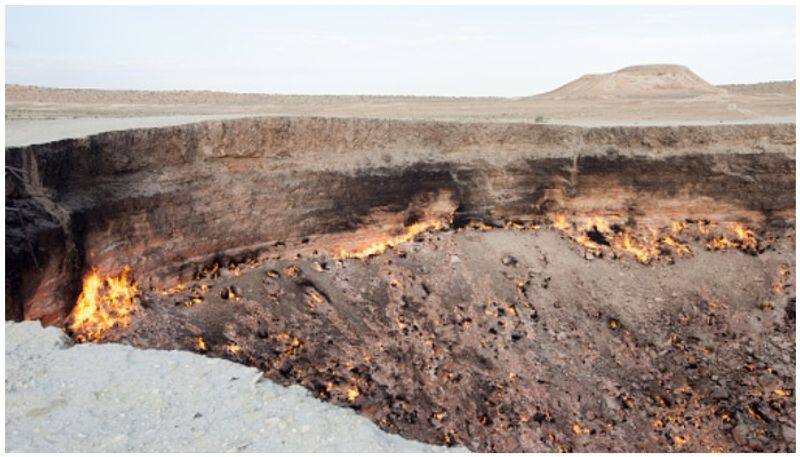 scientists wonders on Darvaza gas crater which has been burning for more than 50 years