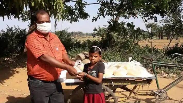 School headmaster in jhanrkhand pulls cart to deliver midday meal to students KPP School headmaster in jhanrkhand pulls cart to deliver midday meal to students KPP