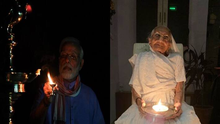 pm modi and Mother Heeraben, lights an earthen lamp to mark fight against Coronavirus KPP pm modi and Mother Heeraben, lights an earthen lamp to mark fight against Coronavirus KPP
