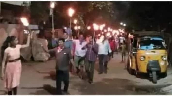 People march on streets with lights People march on streets with lights
